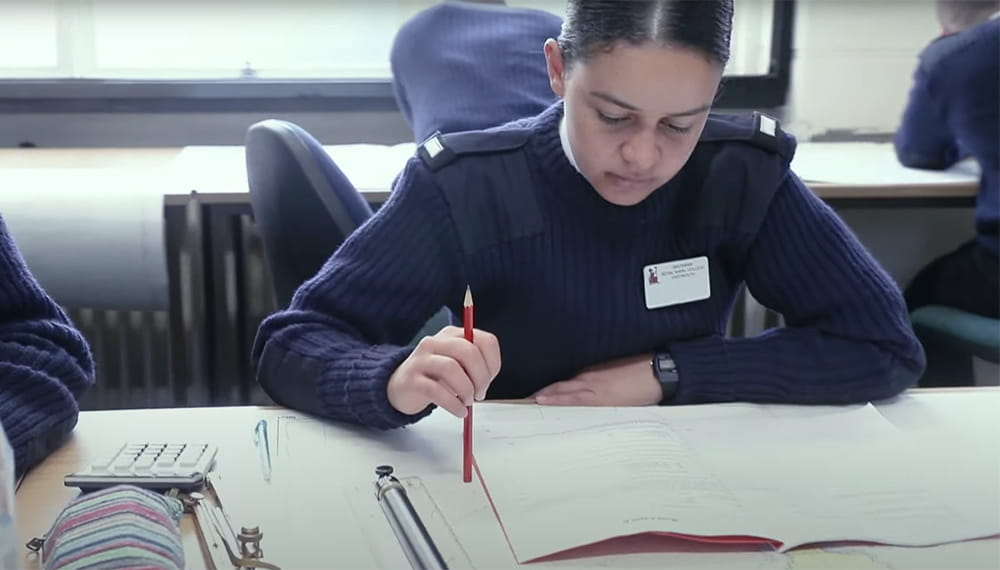 Royal Navy officer studying in the classroom