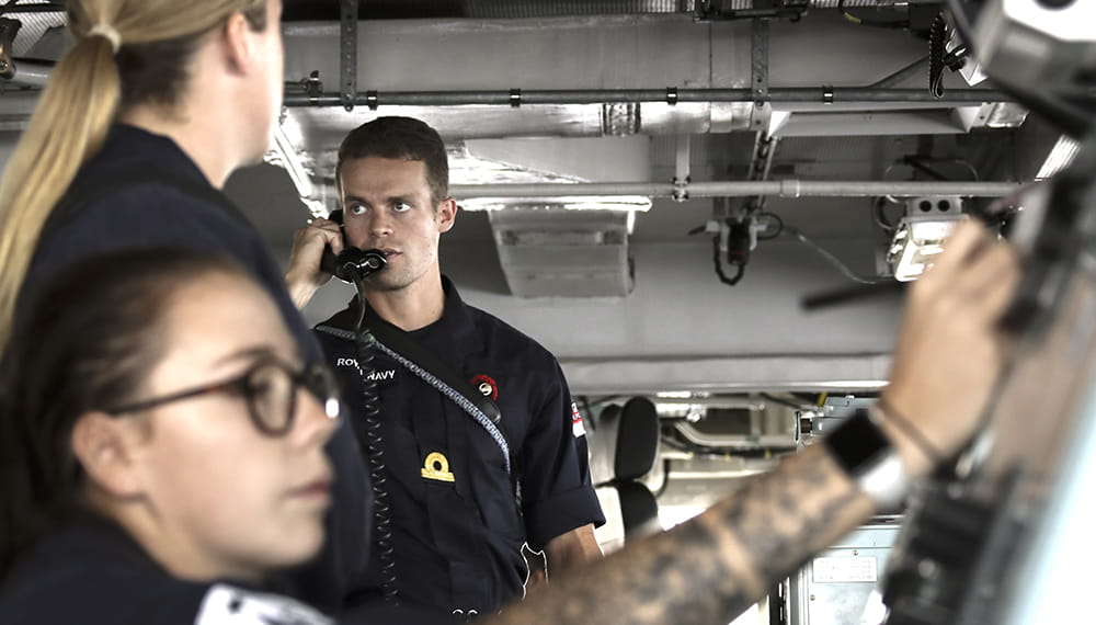 An Officer on HMS Albion communicates with another department. HMS Albion with it's task force partner, HMS Dragon conducted maritime maneuvers with the Egyptian Flotilla consisting of ENS Anwar El Sadat, ENS Sharm El Sheik and ENS Ali Gad.