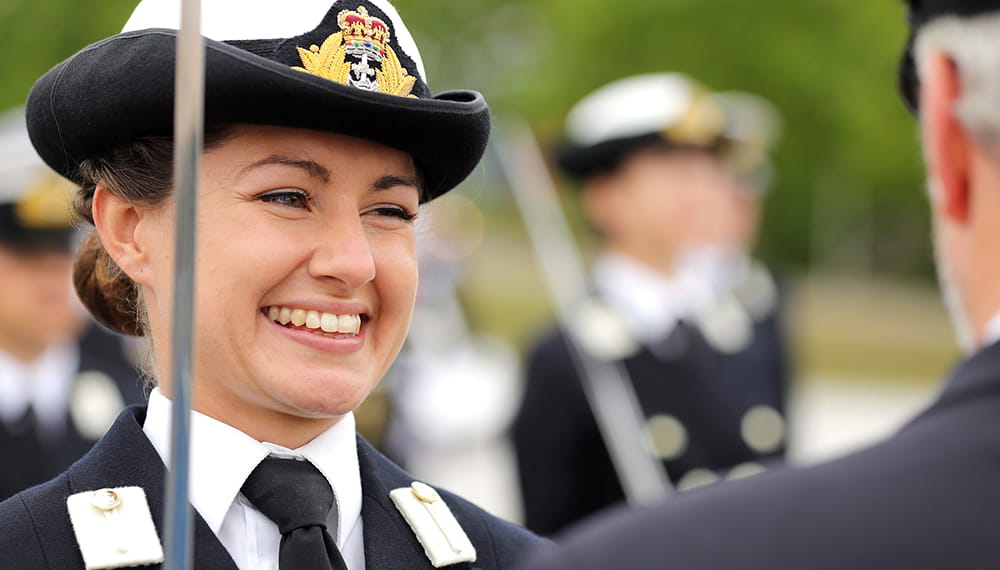 Close-up of Reservist enjoying a joke with the inspecting officer during a passing out ceremony