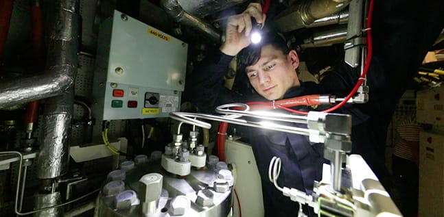 Marine Engineer checking submarine equipment