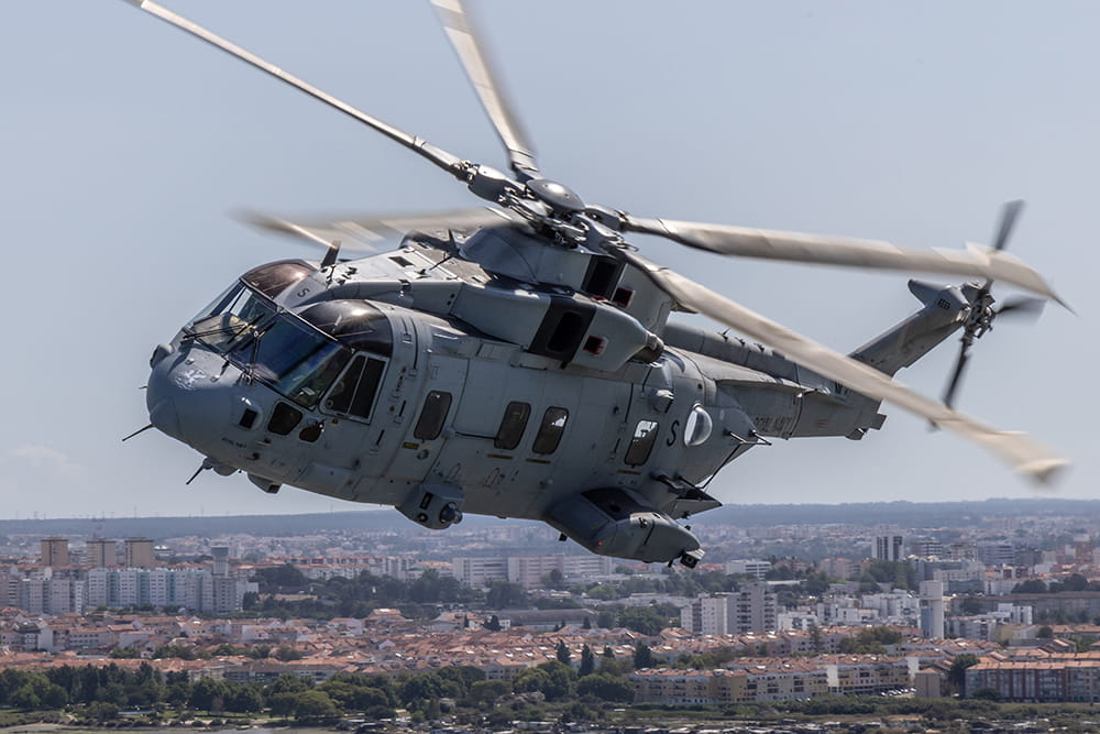 Merlin helicopter flies over town in Portugal