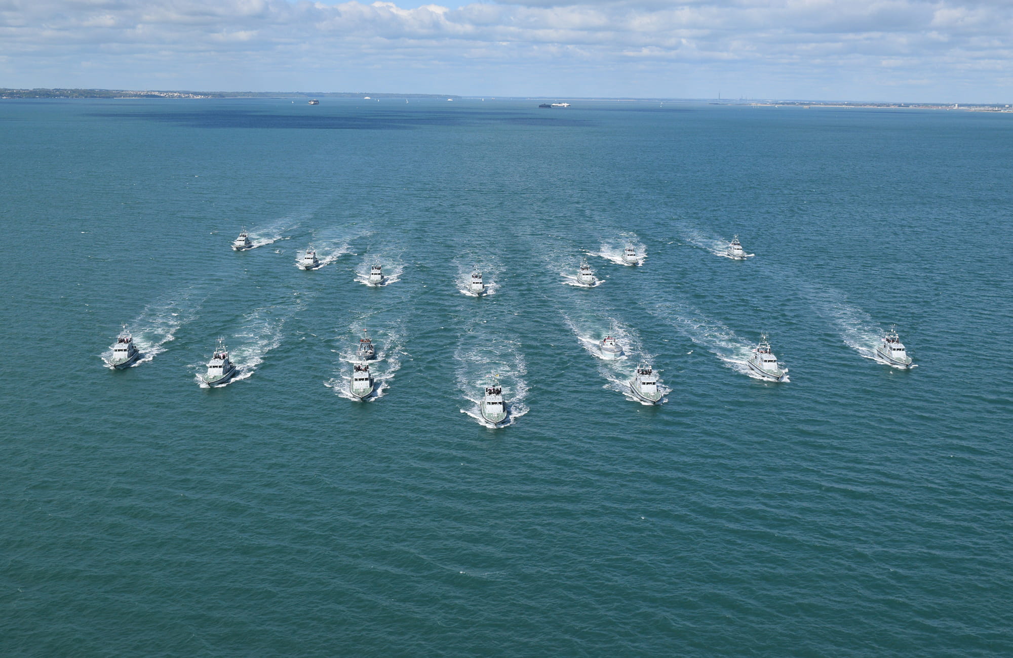All Royal Navy Archer Class ships speed towards the camera