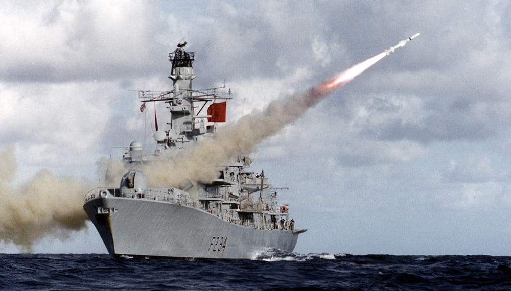 HMS Iron Duke firing a missile out to sea