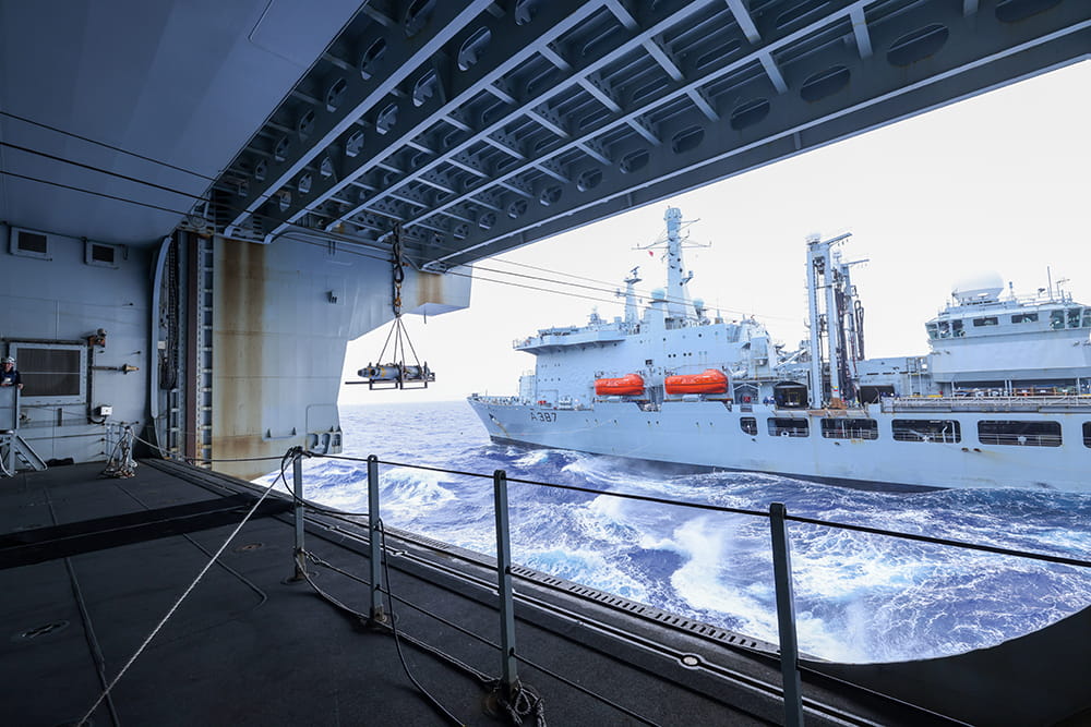 View from the deck of one Royal Navy ship towards another during replenishment at sea