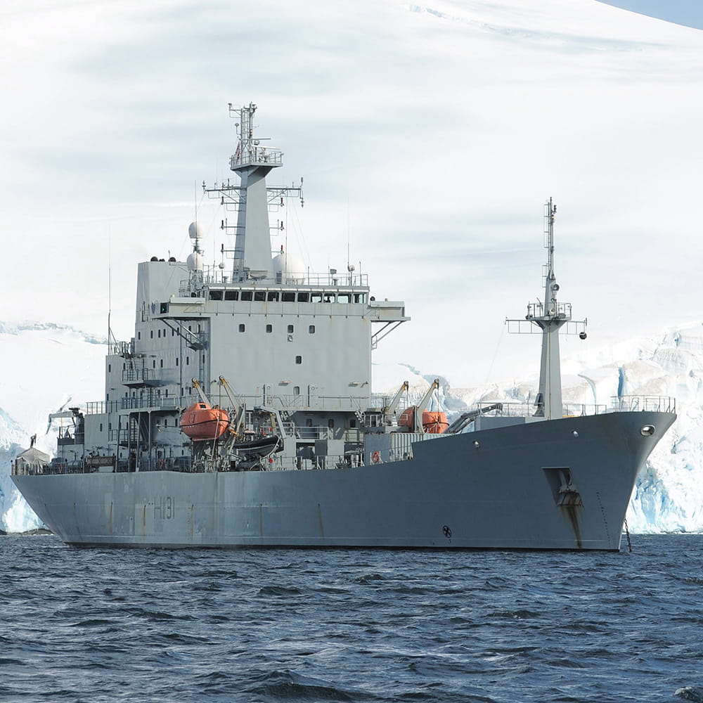HMS Scott in the sea in front of Antarctic ice