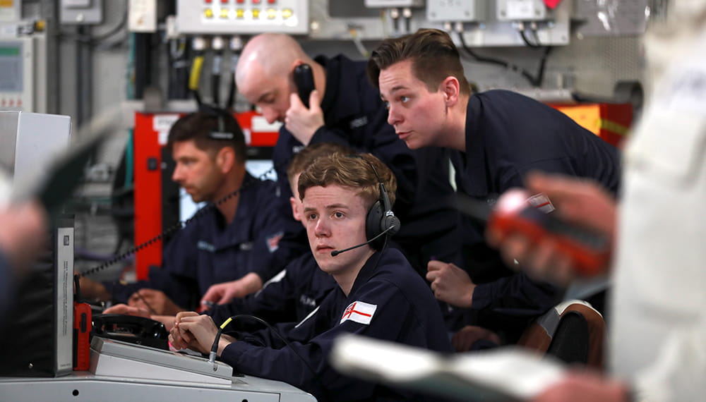 Royal Navy personnel on board HMS QUEEN ELIZABETH the Ship's Head Quarters during a Stage 21 Exercise