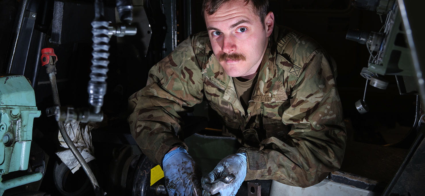 Vehicle mechanic (VM) of Commando Logistics Regiment (CLR) replacing the gearbox on a BV 206 during Exercise Cold Response 2020, Norway