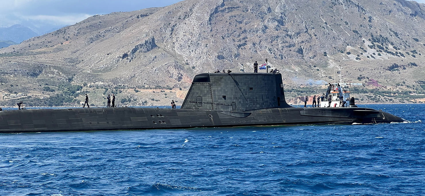 HMS Audacious departs Souda Bay in Crete ahead of NATO training and operations in the Mediterranean.