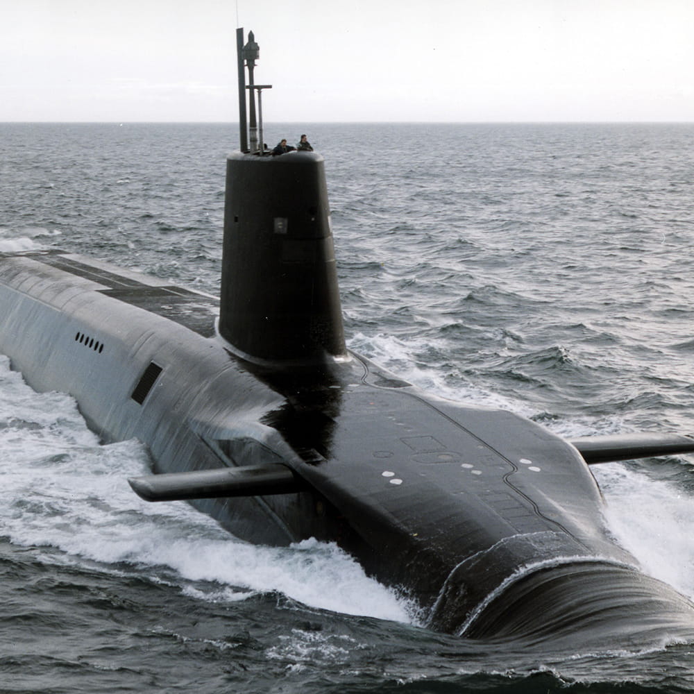 The  submarine HMS Vanguard surfaces